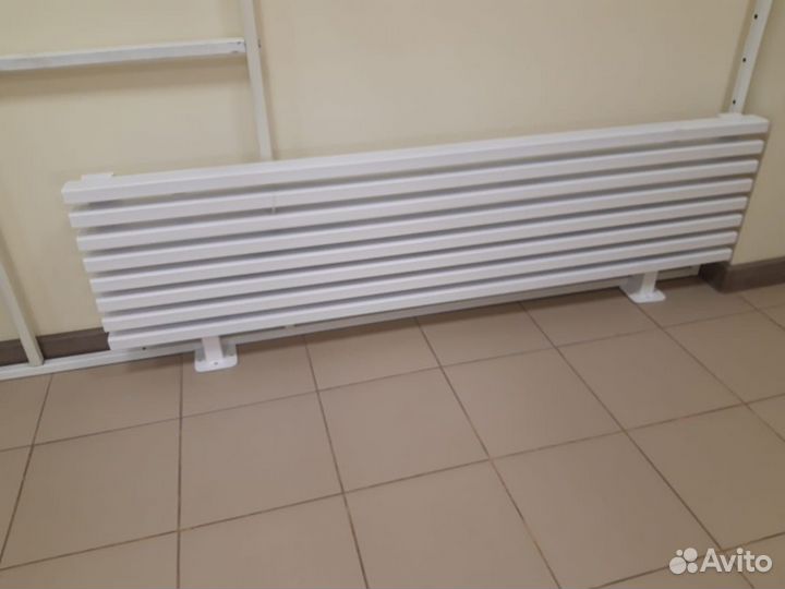 Горизонтальный трубчатый радиатор отопления