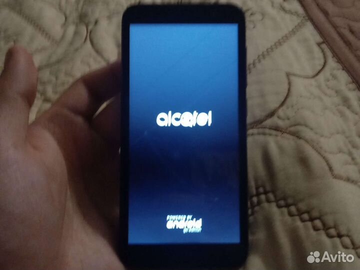 Телефон алкатель