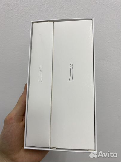 Электрическая зубная щётка