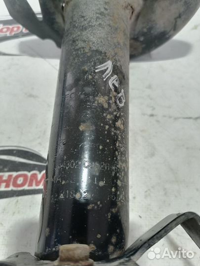 Амортизатор передний левый Logan H4MD438 L8