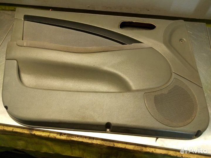 Обшивка двери передняя левая Chevrolet Lacetti