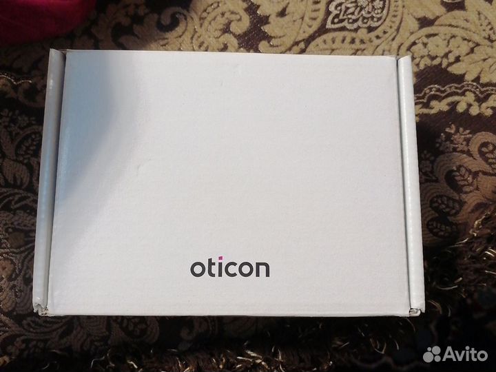 Слуховой аппарат oticon