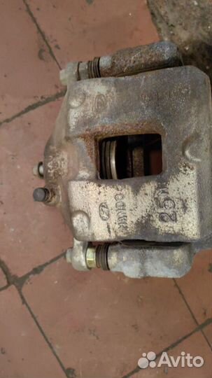 Суппорт передний правый Hyundai Elantra 6