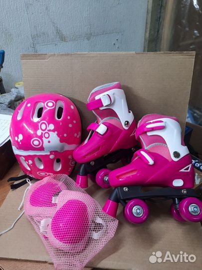 Ролики квады раздвижные розовые