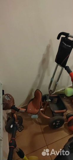 Трехколесный велосипед с ручкой