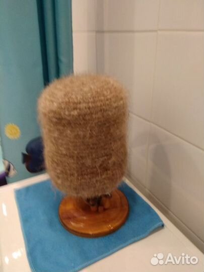 Теплую шапку вязаную из козьего пуха