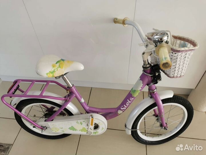 Детский велосипед с боковыми колесами
