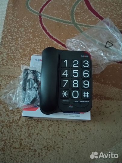 Проводной телефон новый