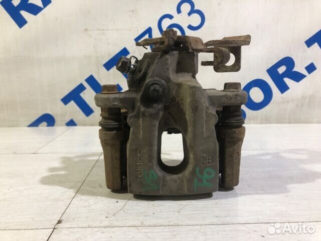 Суппорт задний левый toyota corolla E150 1.6 мт се