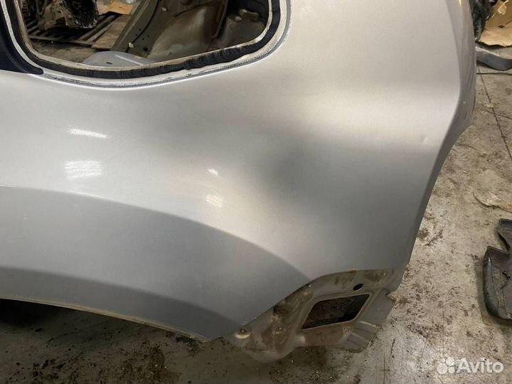 Б/У Крыло заднее левое 7742300Q1F nissan