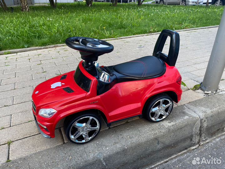 Машинка-каталка с музыкой