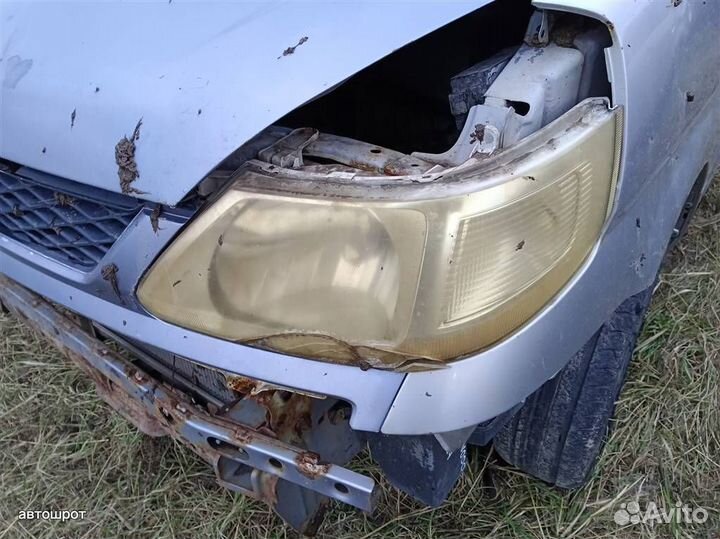 Фара левая Nissan Serena С24 99-05г