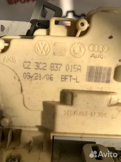 Замок боковой двери передний левый Vw Passat B6