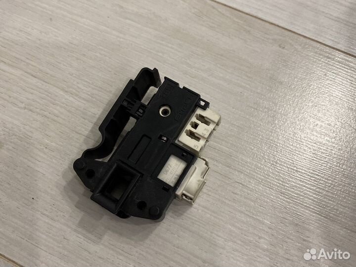 Устройство блокировки люка ariston