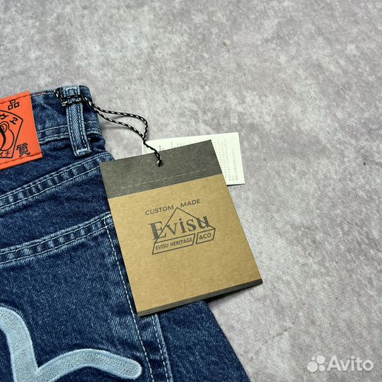 Джинсы Evisu широкие