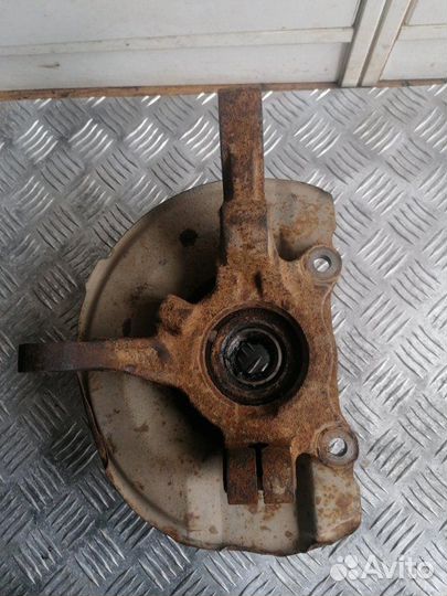 Кулак поворотный лев. перед. Mitsubishi Outlander