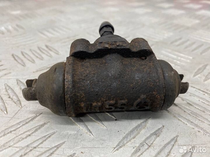 Б/У тормозной цилиндр задний левый Mazda Demio 1