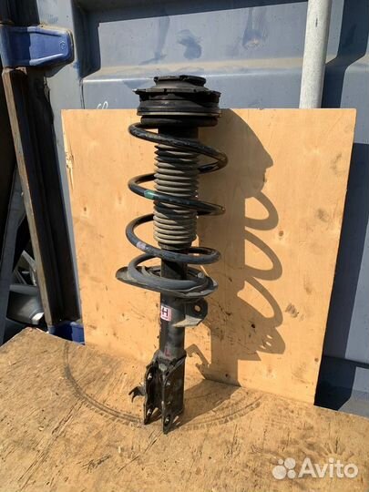 Амортизатор передний левый Nissan X-Trail T31