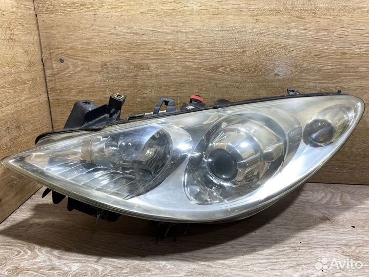 Фара передняя левая Peugeot 307 рест 142472