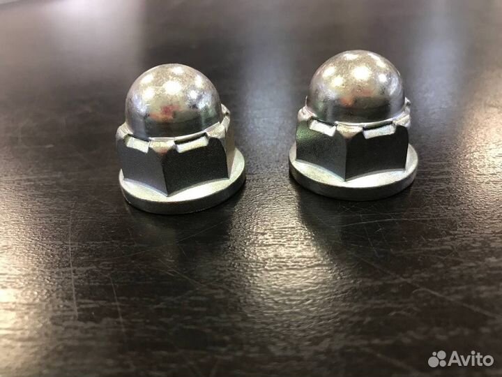 Гайка сход-развального болта заднего продольного