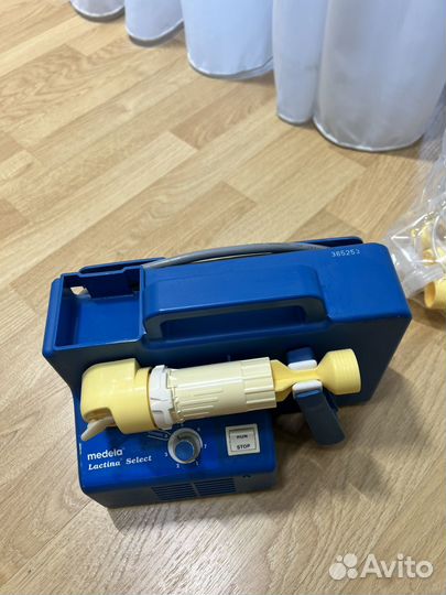 Молокоотсос medela lactina select