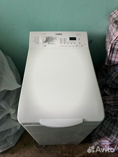 Стиральная машина с верт. загрузкой AEG L56106TL