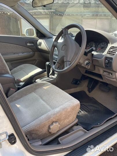 В разборе nissan sunny FB15 QG15-DE 2002