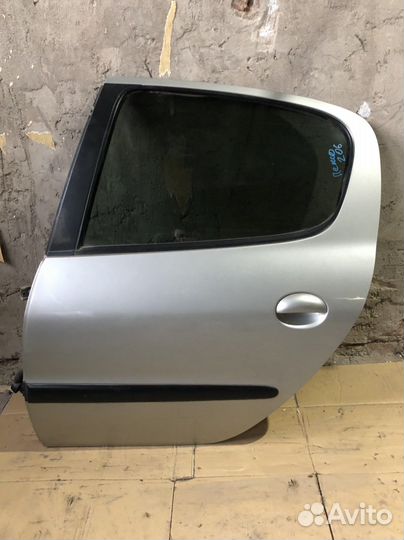 Дверь задняя Peugeot 206