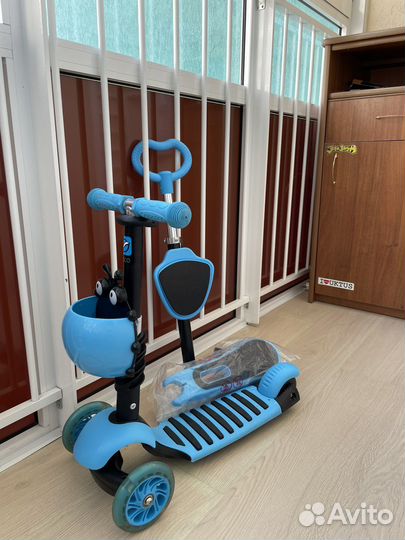 Самокат трехколесный
