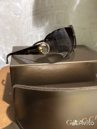 Солнцезащитные очки Gucci