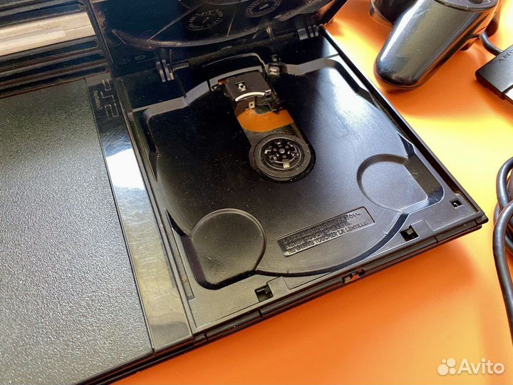 PlayStation 2 Slim чип с дисками