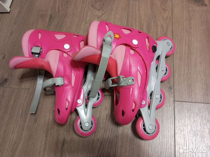 Роликовые коньки