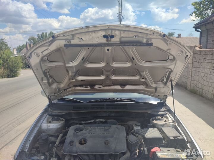 Капот kia cerato 1