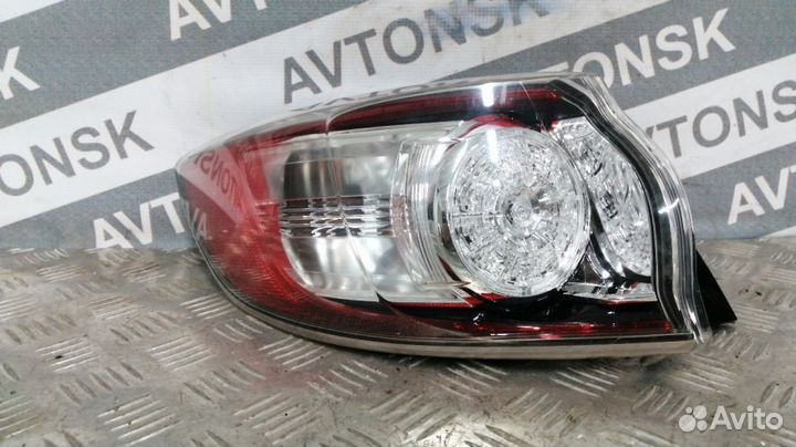 Задний фонарь Mazda Axela Левый