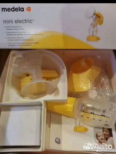 Молокоотсос medela электрический