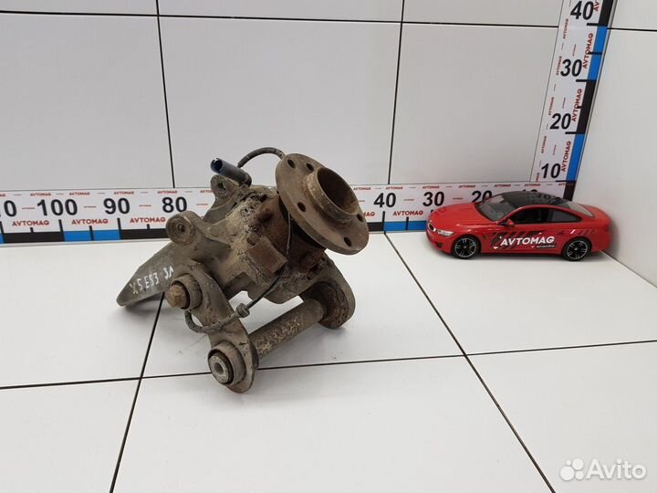 Кулак задний левый (BMW X5)