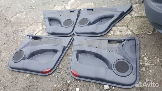 Обшивка двери KIA sportage 2