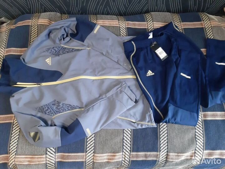 Разминочные костюмы adidas Сб.России муж.48 и 52