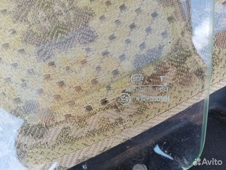 Боковые передние стекла газ 3110