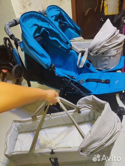 Коляска для двойни новорожденных
