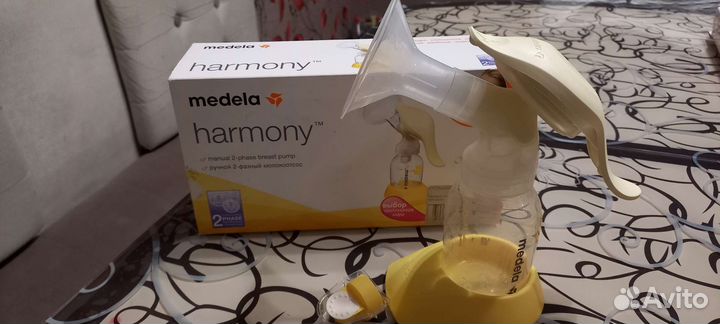Молокоотсос и бутылочки Medela