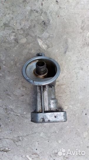 Крепление масляного фильтра Mercedes-Benz W124