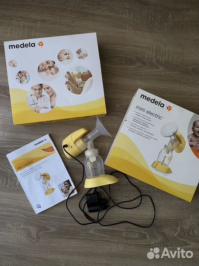 Молокоотсос medela электрический