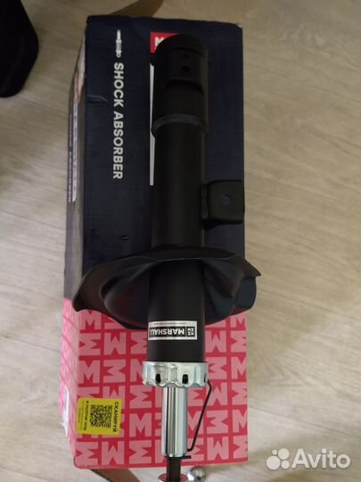 Стойка амортизатора передняя левая