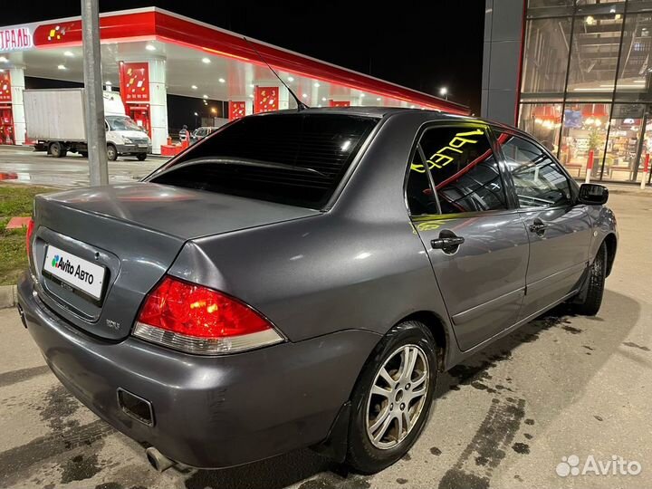 Mitsubishi Lancer 1.3 МТ, 2005, 300 000 км