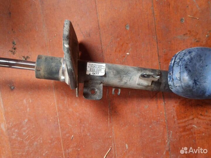 Передний амортизатор