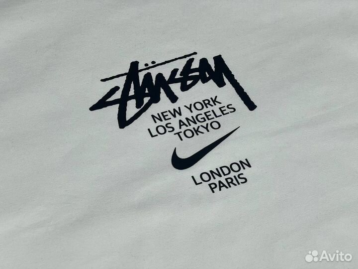 Хлопковая футболка nike stussy paris lux