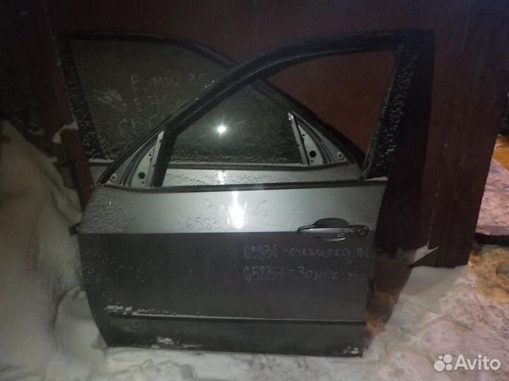 Замок двери передний левый BMW X5 E70