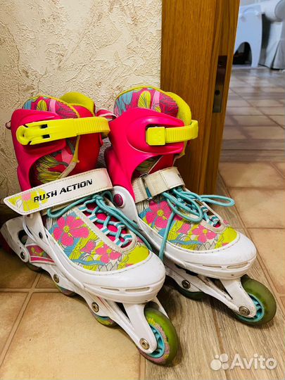 Роликовые коньки