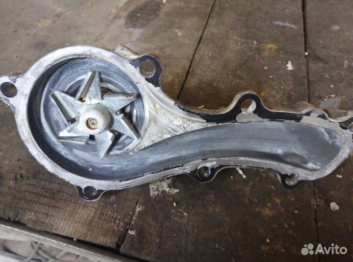Помпа nissan almera